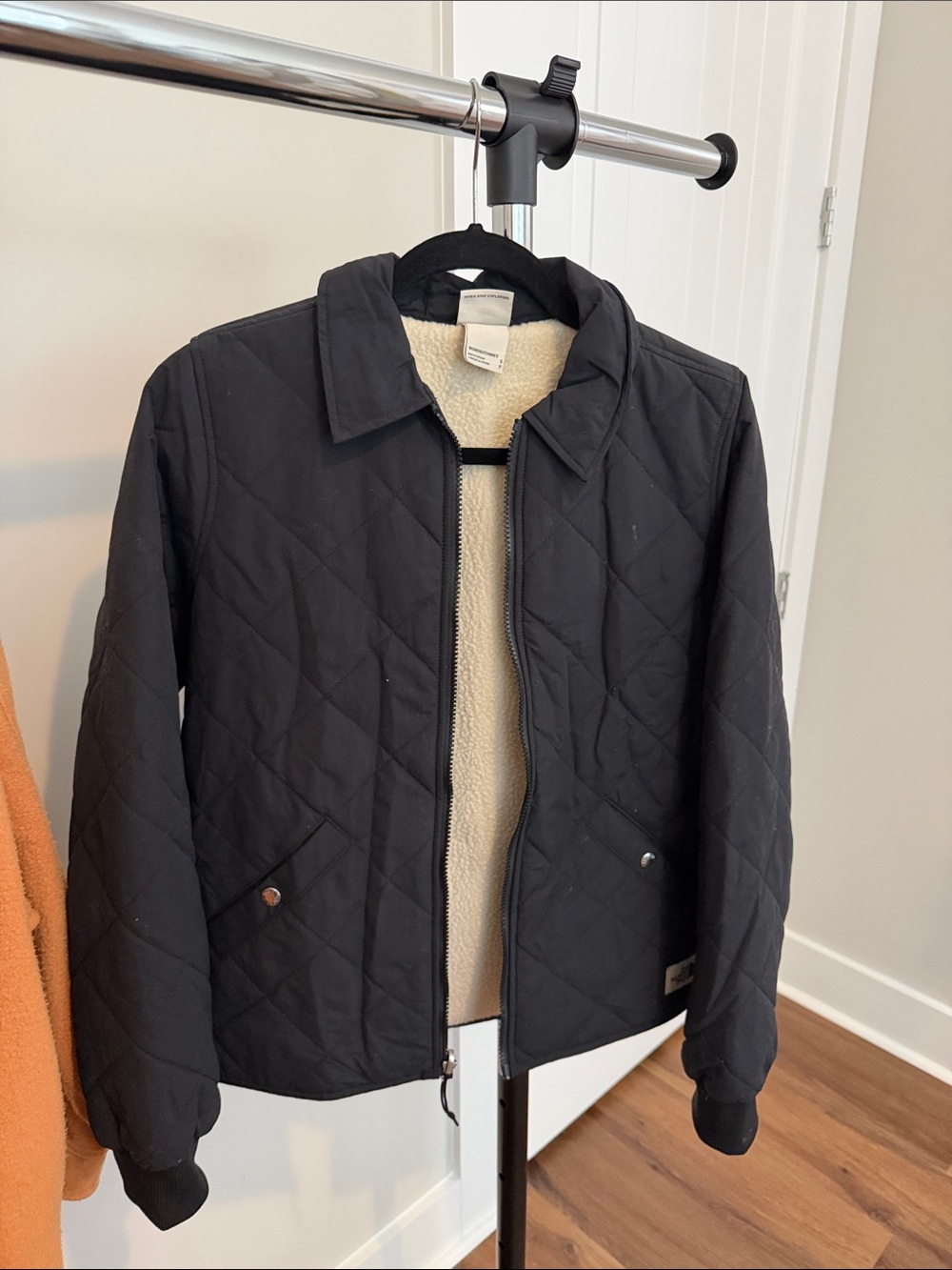 The North Face Black Quilted Jacket with Cream Sherpa Lining